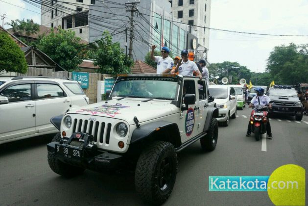Caption: KPU kota Tangerang melaksanankan kampanye Pilkada damai yang di hadiri olehPaslon Arief R. Wismansyah danSachrudin, Minggu (18/2). Dalam kesempatan itu KPU mengajak masyarakat untuk hadir di TPS pada 27 juni 2018 mendatang. Foto: Fajrin/Katakota
